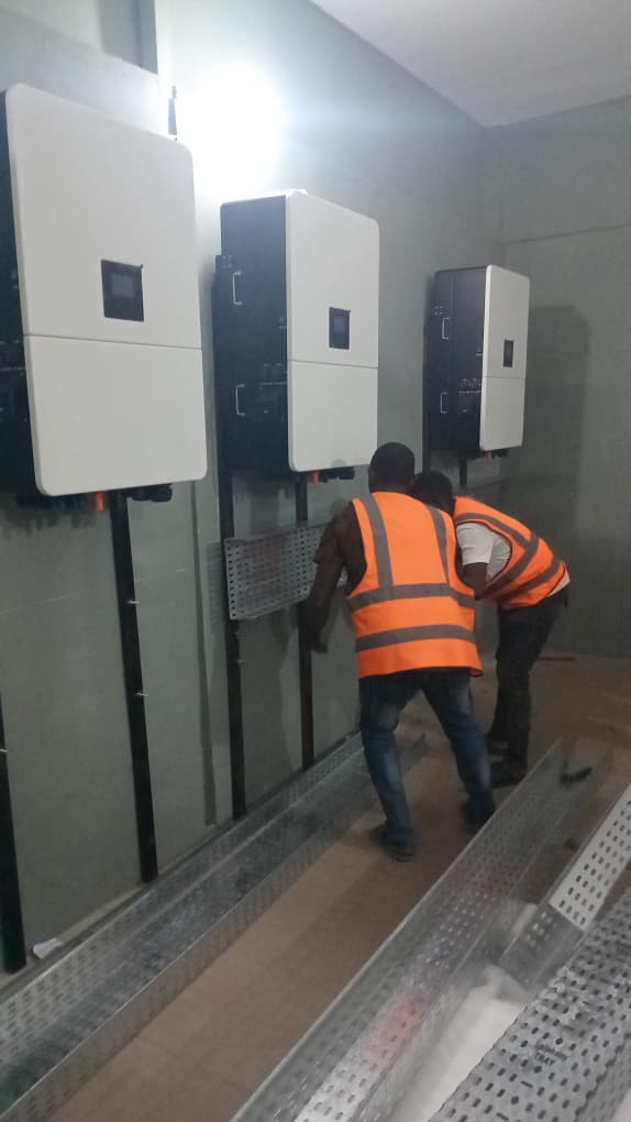 Enerplaz team reviewing solar deployment plans with a client